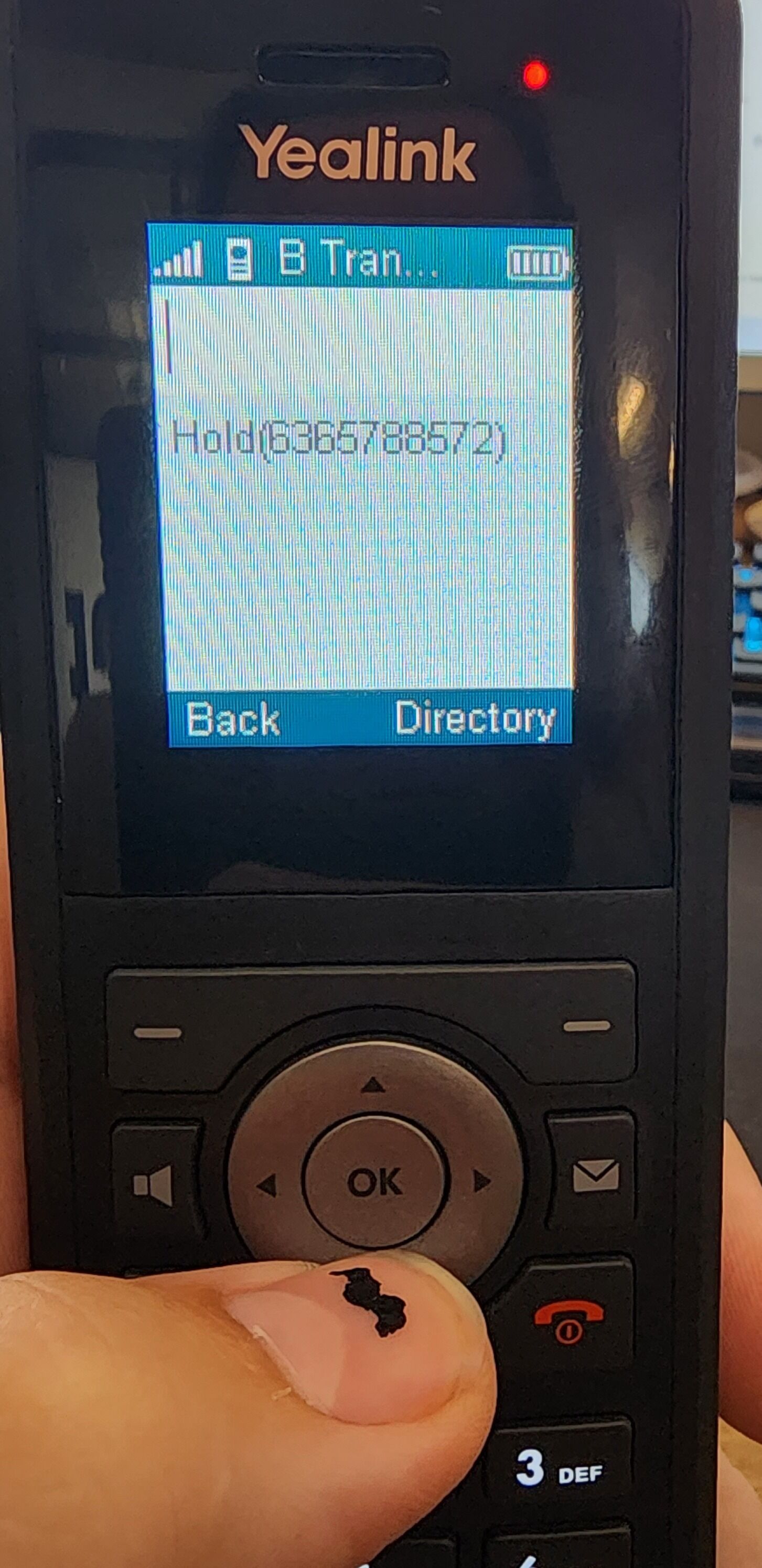Screenshot of: Use the arrow keys to select the call that has been placed on hold.