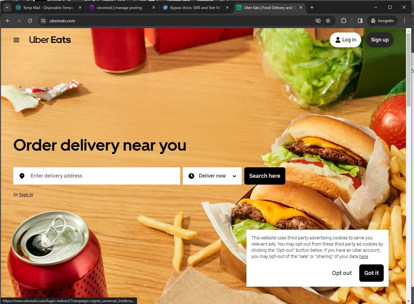 The Uber Eats homepage with the Sign-Up button highlighted.