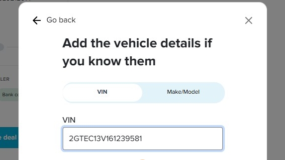Pop-up titled “Add the vehicle details if you know them,” showing VIN and Make/Model input tabs. A VIN number has been entered in the VIN field.
