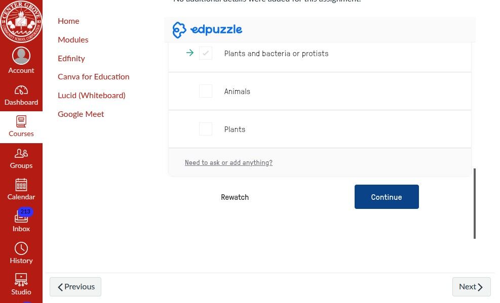 Interface showing a multiple-choice question from Edpuzzle. The question asks about 'Plants and bacteria or protists' with options for 'Animals' and 'Plants'.  A ‘Continue’ button is visible to proceed."